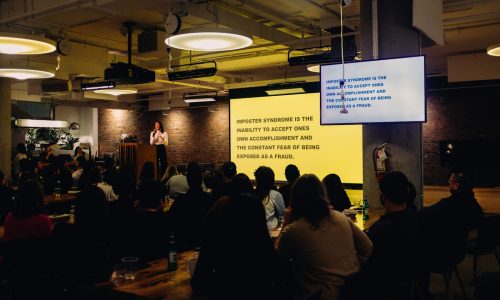 unknown persons sitting indoors